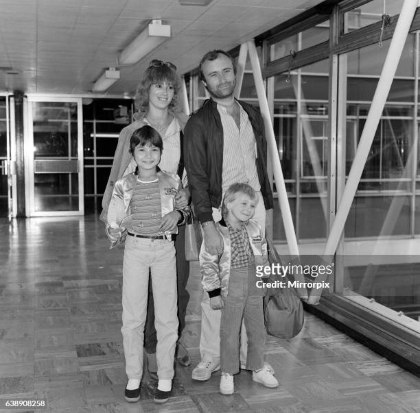 Phil Collins of pop group Genesis, with girlfriend Jill Tavelman and his children 10-year old Joely and 5-year-old Simon for a months tour of the...
