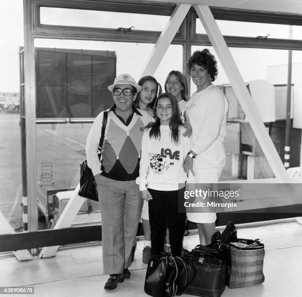 Ronnie Corbett and his wife Anne with children Emma, 13 and Sophie 11 and the children's nanny Debbie Oliver arriving at Heathrow Airport from Los...