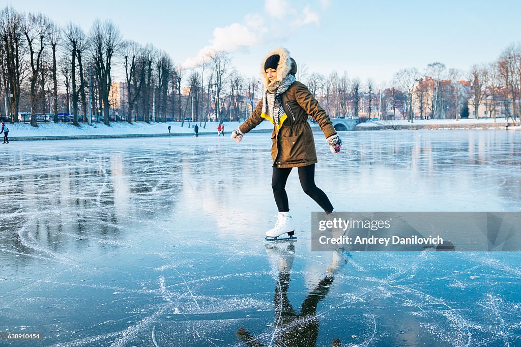 Ice skating on the frozen lake