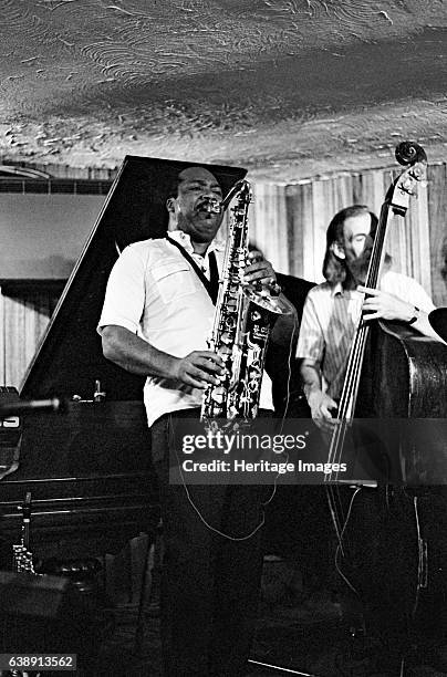 Nathan Davis and P Ind, Bass Clef, Hoxton Square, London, Aug 1987. Artist Brian O'Connor.