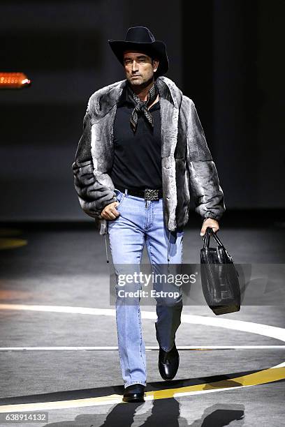 Model walks the runway at the Billionaire show during Milan Men's Fashion Week Fall/Winter 2017/18 on January 16, 2017 in Milan, Italy.