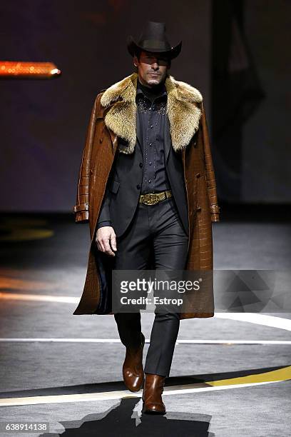 Model walks the runway at the Billionaire show during Milan Men's Fashion Week Fall/Winter 2017/18 on January 16, 2017 in Milan, Italy.