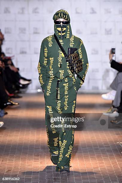 Model walks the runway at the Palm Angels show during Milan Men's Fashion Week Fall/Winter 2017/18 on January 16, 2017 in Milan, Italy.