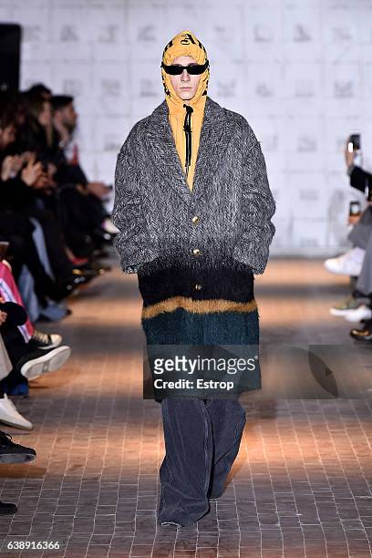 Model walks the runway at the Palm Angels show during Milan Men's Fashion Week Fall/Winter 2017/18 on January 16, 2017 in Milan, Italy.