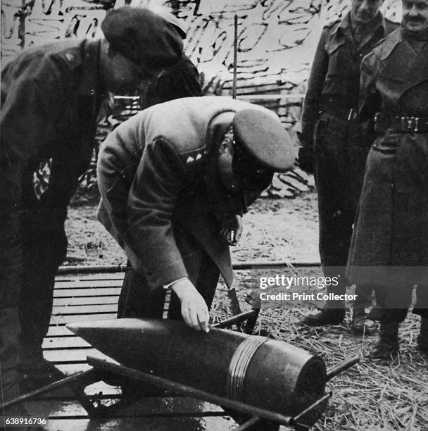 Autographing Chest Mr. Churchill autographing a present for Hitler', c1940s, . From ...