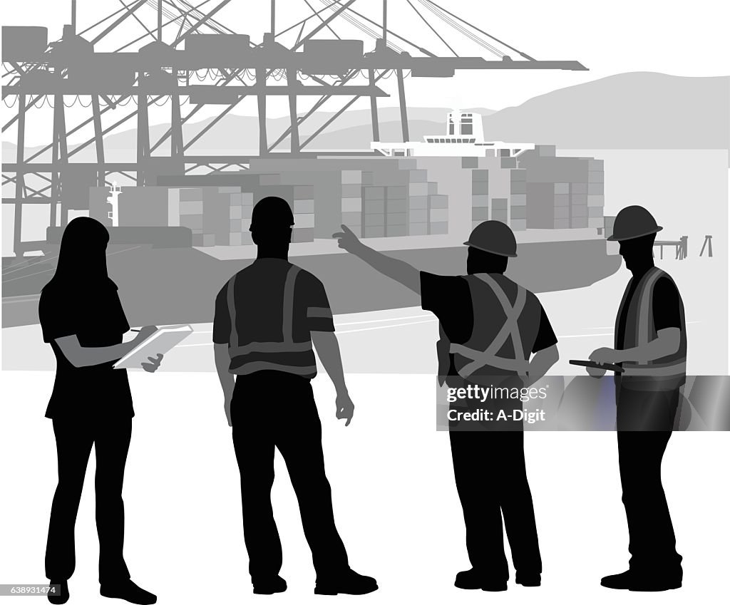 Vorarbeiter instrukt die Arbeiter am Hafen an