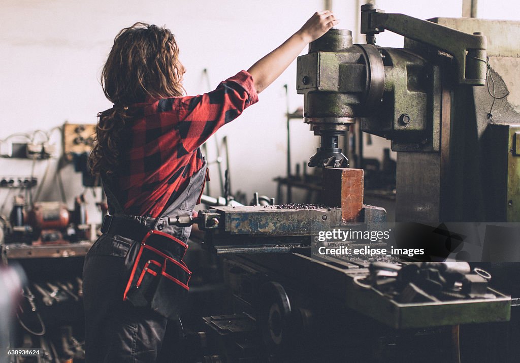 Woman working in production