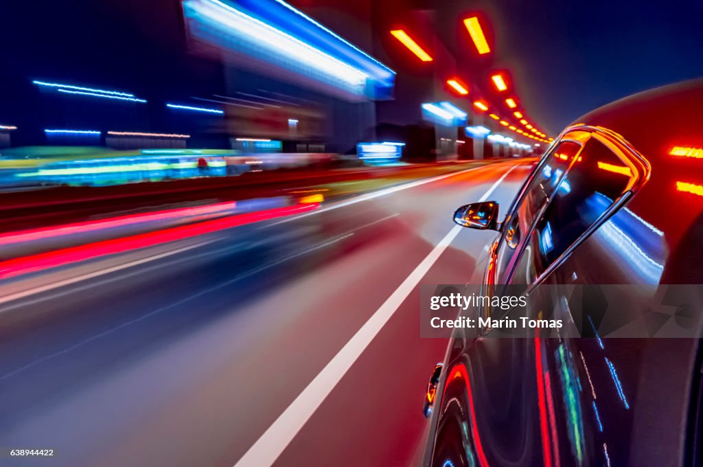 Night car driving downtown