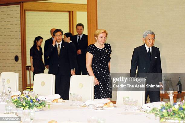 Emperor Akihito escorts Lyudmila Putin, wife of Russian President Vladimir Putin prior to their luncheon at the Imperial Palace on September 4, 2000...