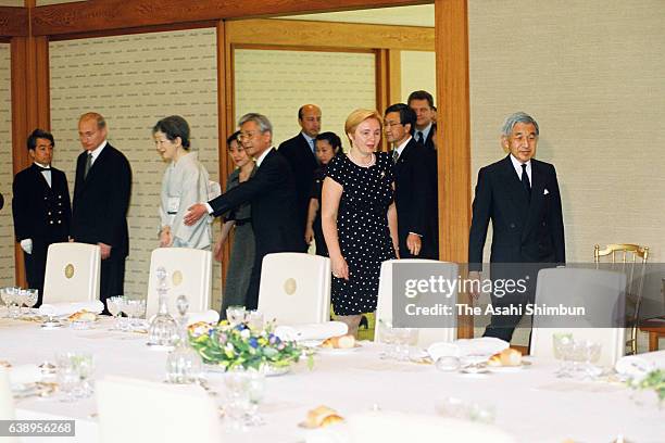 Emperor Akihito escorts Lyudmila Putin, wife of Russian President Vladimir Putin prior to their luncheon at the Imperial Palace on September 4, 2000...