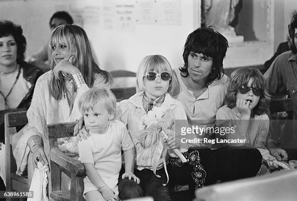 English musician Keith Richards with his partner Anita Pallenberg and children at the wedding of Mick Jagger and Nicaraguan-born Bianca Pérez-Mora...