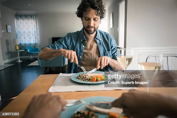 two friends have a meal from a personal perspectiv - plate eating table imagens e fotografias de stock