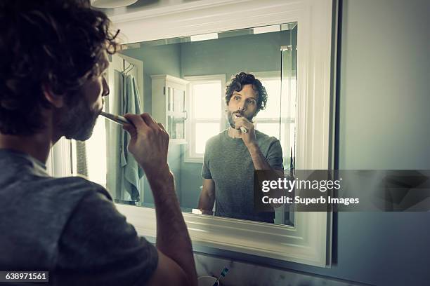 daily in the life - brushing teeth stock pictures, royalty-free photos & images
