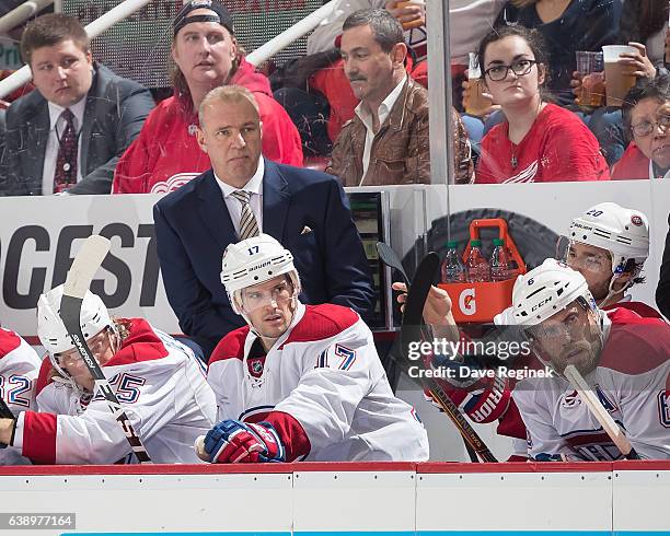 Head coach Michel Therrien of the Montreal Canadiens watches the action from the bench against the Detroit Red Wings during an NHL game at Joe Louis...