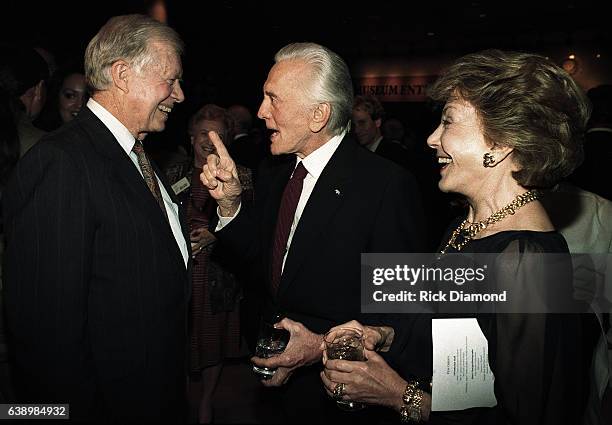 Atlanta - Circa October 1994: Former President Jimmy Carter, Actor Kirk Douglas and Anne Douglas attend Former President Jimmy Carter surprise 70th....