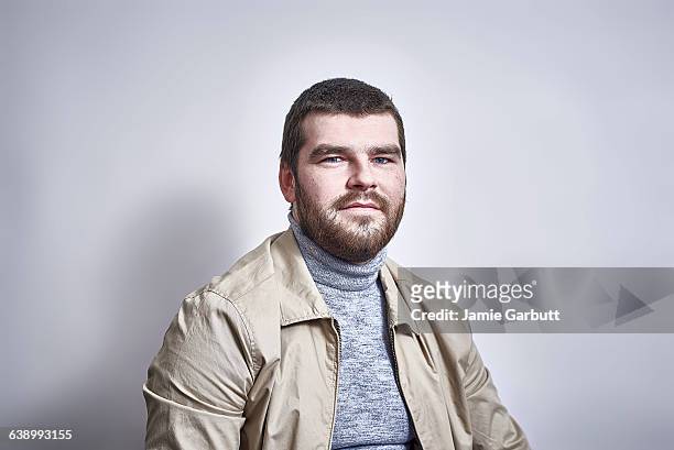 british bearded male looking to camera - macho stock pictures, royalty-free photos & images