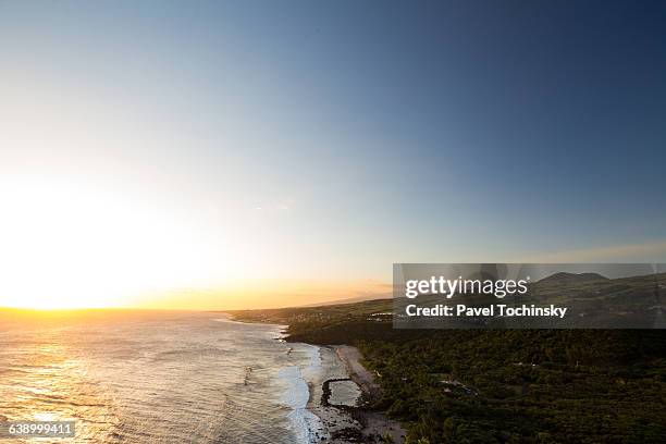 sunset above the famous grande anse beach, réunion - saint pierre de la reunion stock pictures, royalty-free photos & images