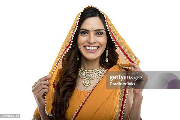 beautiful indian woman in sari - sari isolated stock pictures, royalty-free photos & images