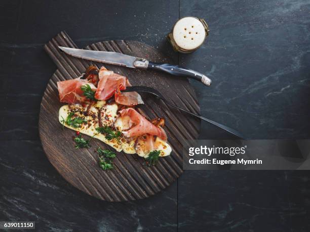 prosciutto with porcini, cheese and herb - prosciutto stock photos et images de collection