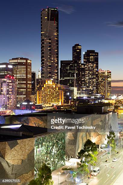 eureka tower and southbank skyline at dusk - federation square melbourne stock pictures, royalty-free photos & images