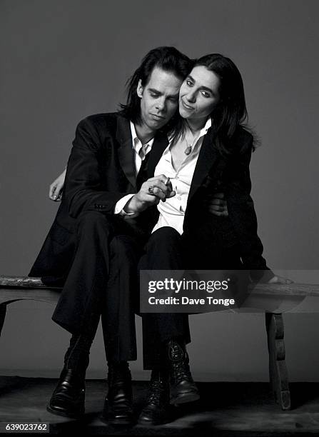 Portrait of Australian singer-songwriter Nick Cave and English singer-songwriter PJ Harvey to promote their duet 'Henry Lee' from the album 'Murder...