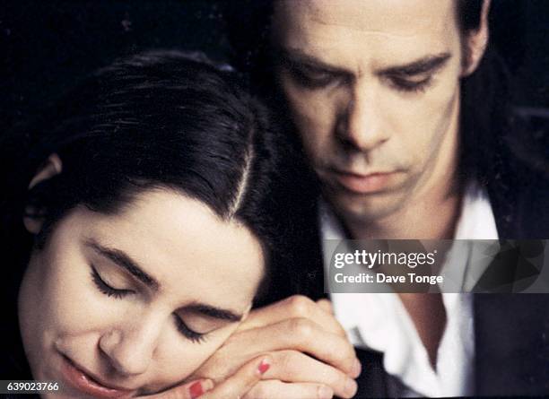 Portrait of Australian singer-songwriter Nick Cave and English singer-songwriter PJ Harvey to promote their duet 'Henry Lee' from the album 'Murder...