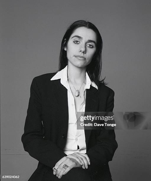 Studio portrait of English singer-songwriter PJ Harvey during promotion of her duet with Nick Cave 'Henry Lee', United Kingdom, 1995.