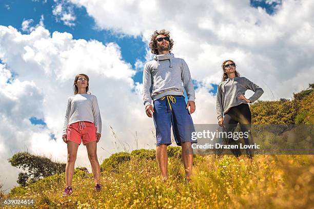 recreation and hiking on hills in nature for healthy lifestyle - orienteering run stock pictures, royalty-free photos & images