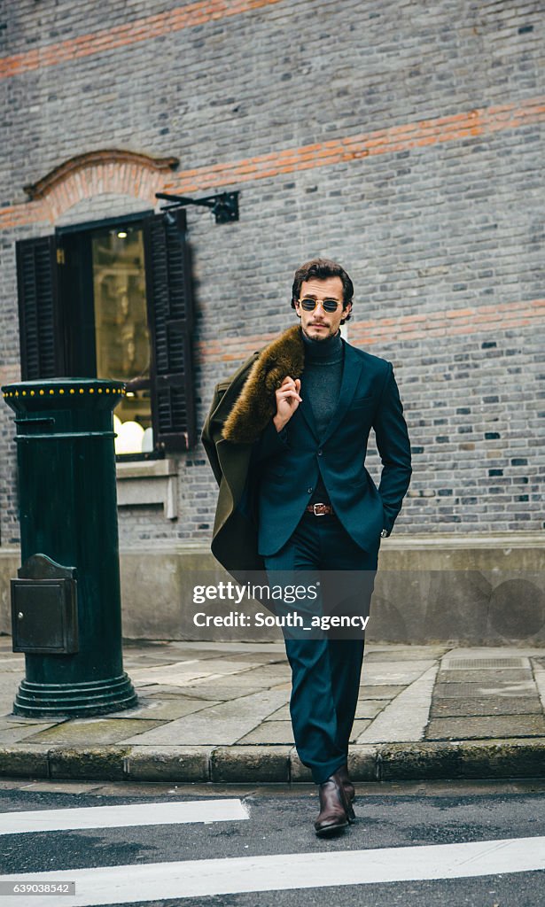 Elegant man taking a walk