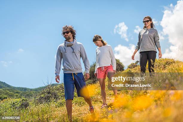 recreation and hiking on hills in nature for healthy lifestyle - orienteering run stock pictures, royalty-free photos & images