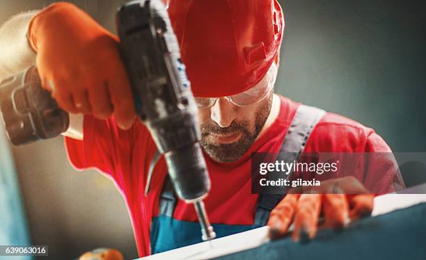 construction worker. - red glove stock pictures, royalty-free photos & images