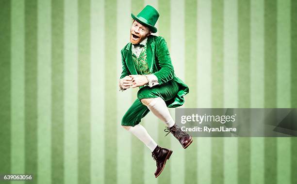 dancing leprechaun man on st. patricks day - irish culture stock pictures, royalty-free photos & images