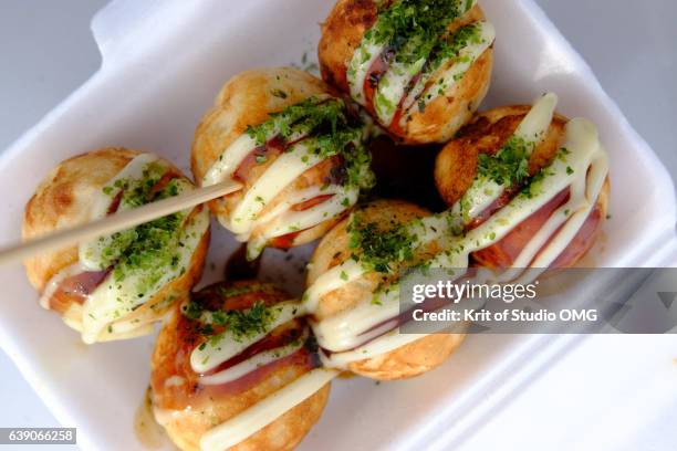 high angle view of takayuki in foam box - takoyaki stock pictures, royalty-free photos & images