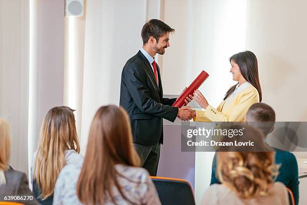 employee of the month received award on ceremony - employee of the month stock pictures, royalty-free photos & images