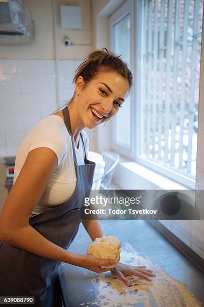 young baker kneading dough - baking competition stock pictures, royalty-free photos & images