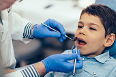 Little boy having regular dental check-up