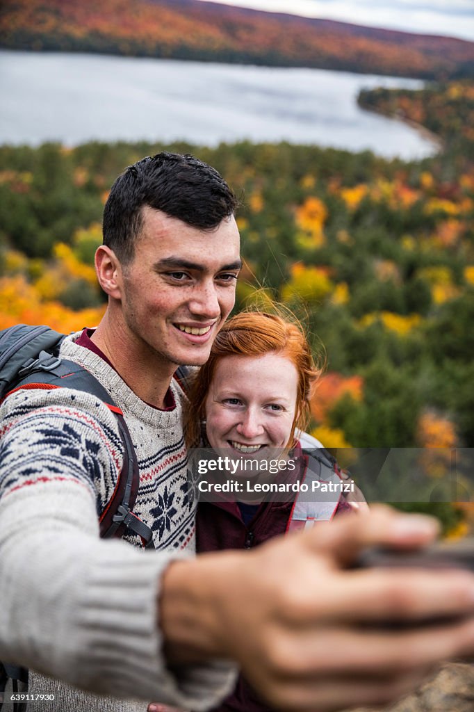 Selfie with a view on a mountain peak in Canada