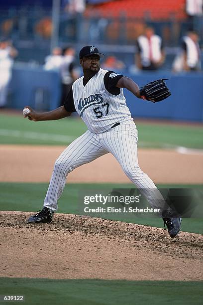 Antonio Alfonseca of the Florida Marlins throws the ball during the game against the New York Mets at the Pro Players Stadium in Miami, Florida. The...