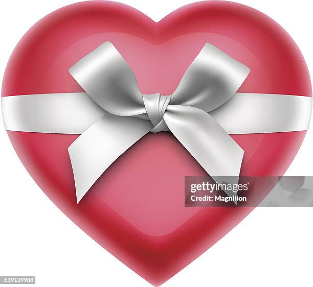 red heart with bow - gift top view stock illustrations