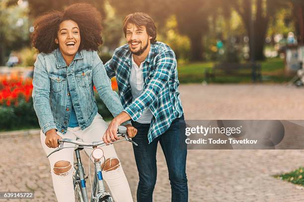 learning to ride a bicycle - joy ride stock pictures, royalty-free photos & images