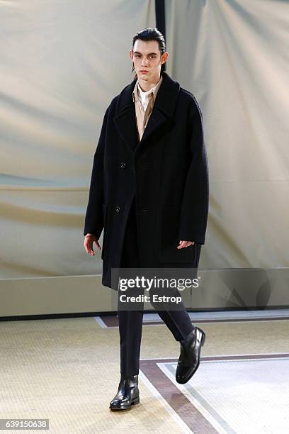 Model walks the runway during the Lemaire Menswear Fall/Winter 2017-2018 show as part of Paris Fashion Week on January 18, 2017 in Paris, France.