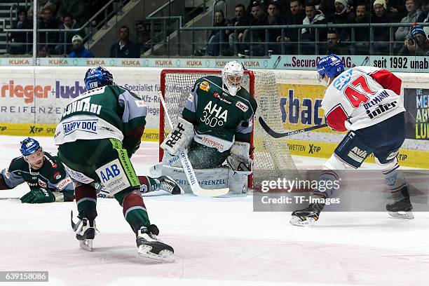 Goalie Jonathan Boutin of Augsburger Panther and Christoph Ullmann of Adler Mannheim battle for the ball during the DEL match between Augsburg...