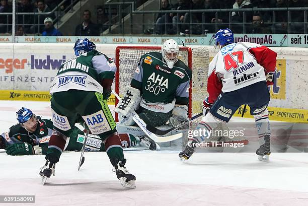 Goalie Jonathan Boutin of Augsburger Panther and Christoph Ullmann of Adler Mannheim battle for the ball during the DEL match between Augsburg...