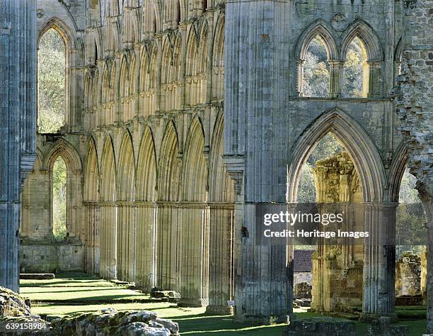 Rievaulx Abbey, North Yorkshire, c1990-2010. The arches on the south side of the presbytery from the middle of the abbey church - autumn colour. A...