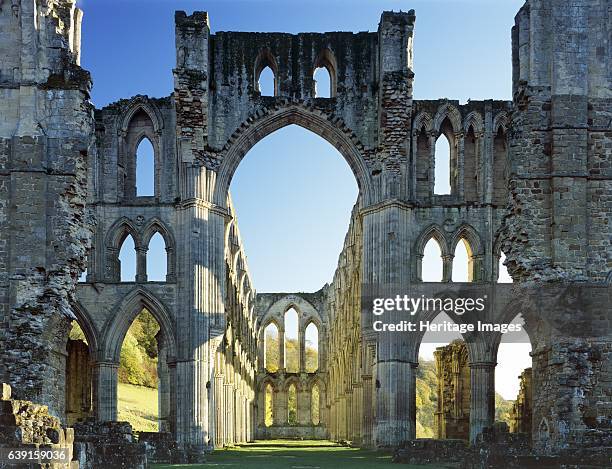 Rievaulx Abbey, North Yorkshire, c1990-2010. The crossing and east end of the abbey church showing autumn colour on the trees beyond. A former...