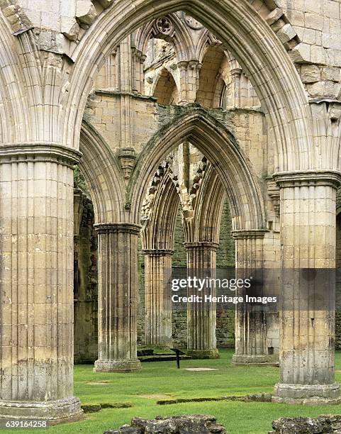Rievaulx Abbey, North Yorkshire, c1990-2010. The arches and buttresses of the north side of the abbey church. A former Cistercian abbey in the North...