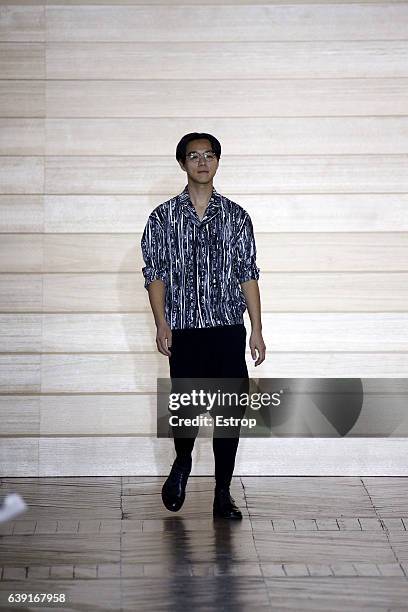 Designer Yusuke Takahashi walks the runway during the Issey Miyake Men designed by Yusuke Takahashi Menswear Fall/Winter 2017-2018 show as part of...