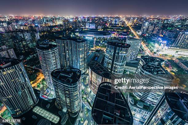 aerial view of sanlitun soho and beijing city urban skyline at night - china u s strategic and economic dialogues helds in beijing fotografías e imágenes de stock