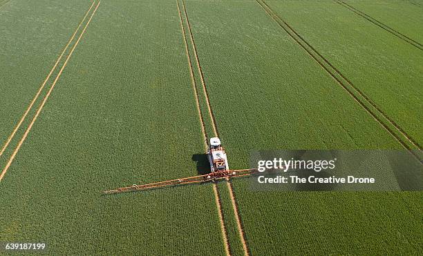 crop sprayer - herbicide spraying stock pictures, royalty-free photos & images