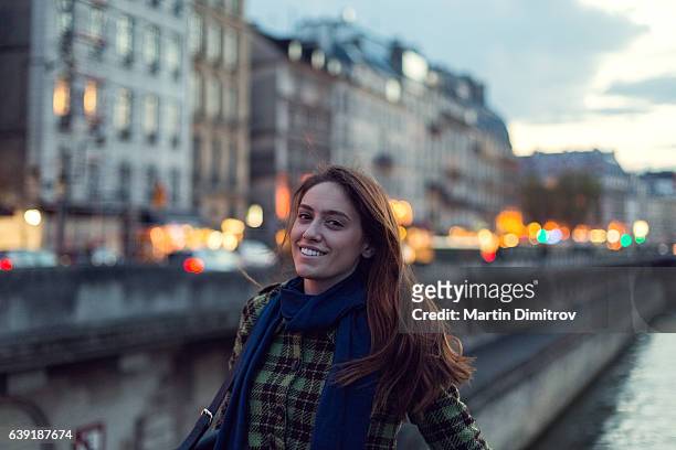 young woman enjoying paris - paris street stock pictures, royalty-free photos & images